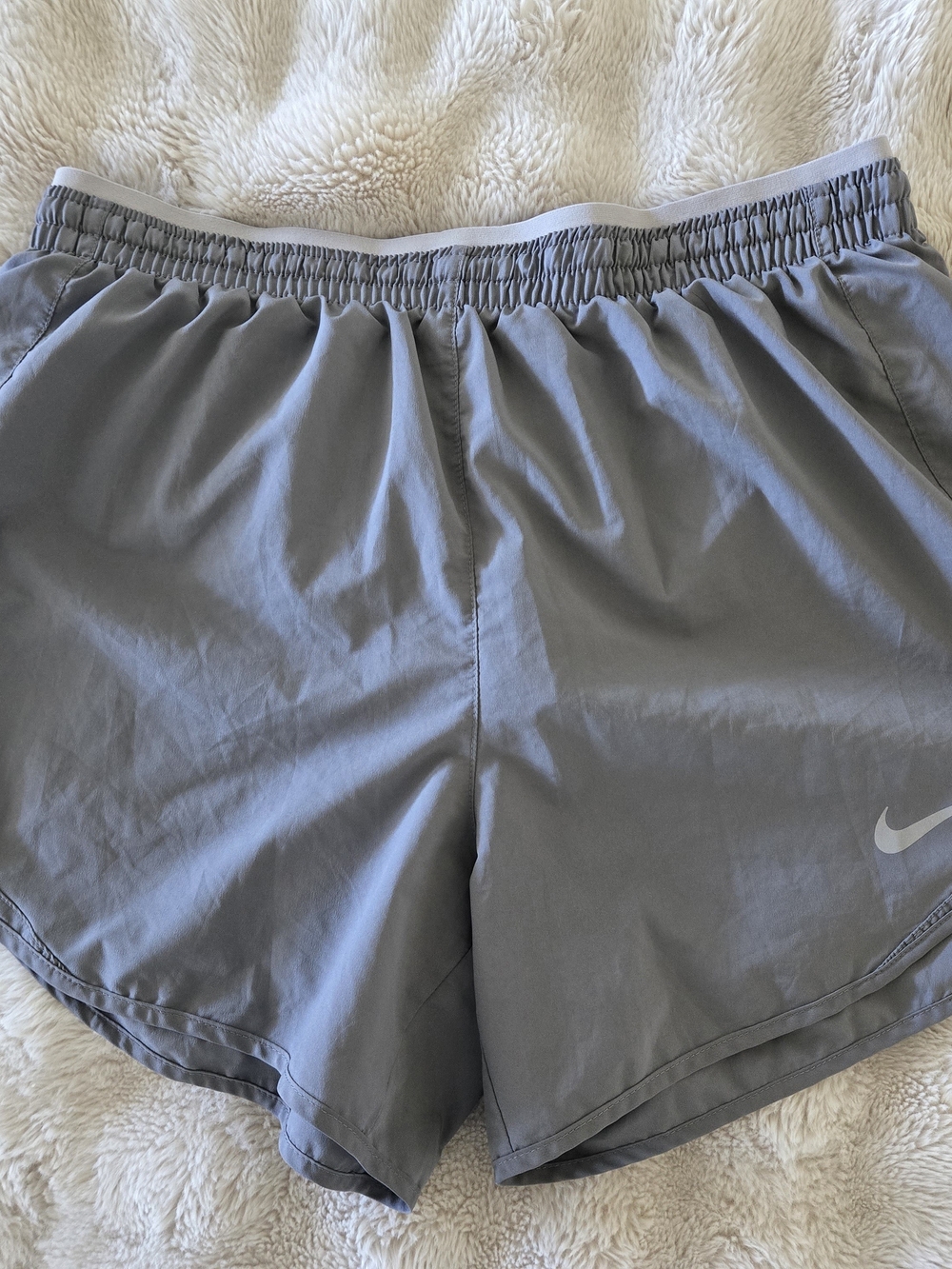Nike Women's Light Gray Athletic Shorts with Swoosh
